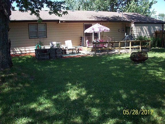 inside fenced back yard