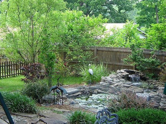 Professionally landscaped back yard.