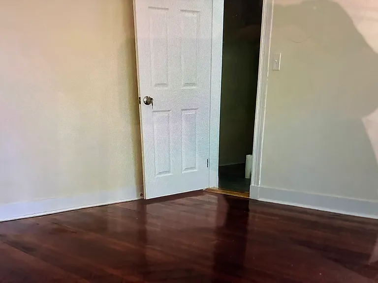 Beautiful hardwood floors flow throughout the entire floor plan including a spacious master bedroom.