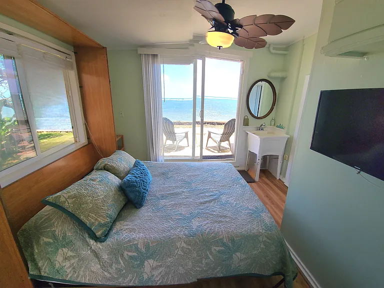 King Bed with patio and ensuite full bathroom.