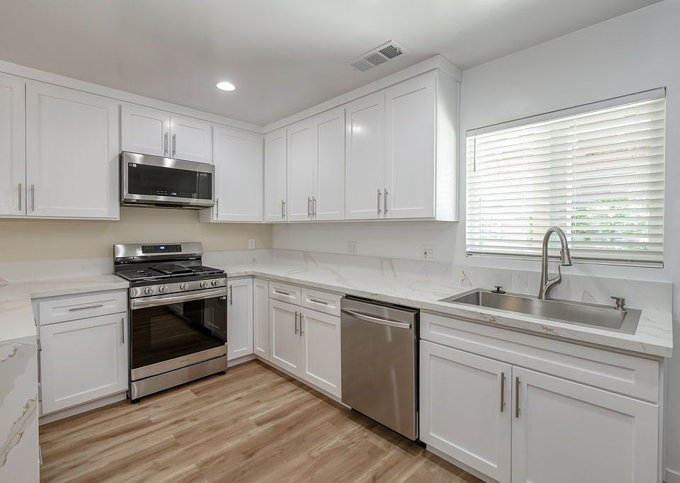 Luxury Kitchen & Appliances, LVP Flooring, Dual Pane Windows, Ceiling Fans, TV Mounts.