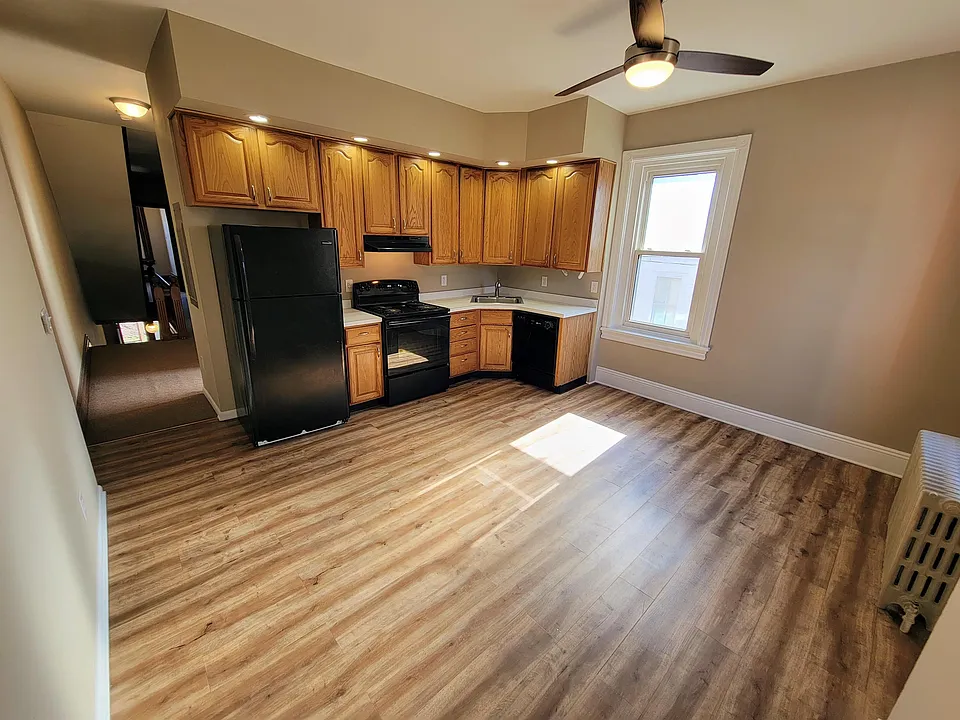 kitchen with view of interior stairs from 1st floor/foyer to left
