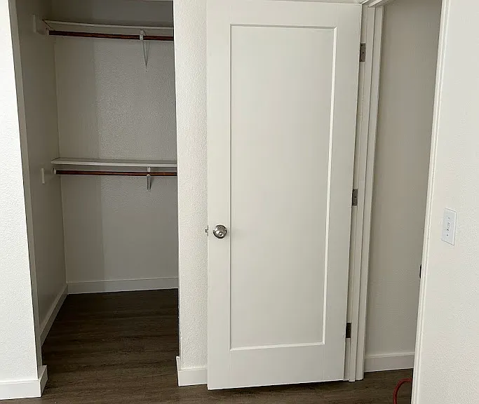 main bedroom has a large walk in closet