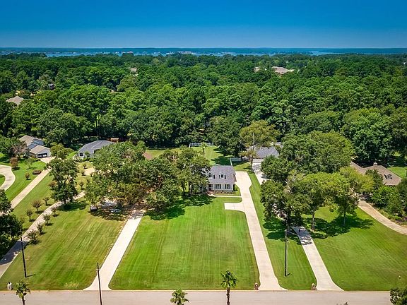 Aerial View Shows Depth of the Lot - Backs to an Acreage Estate Property in Point Aquarius