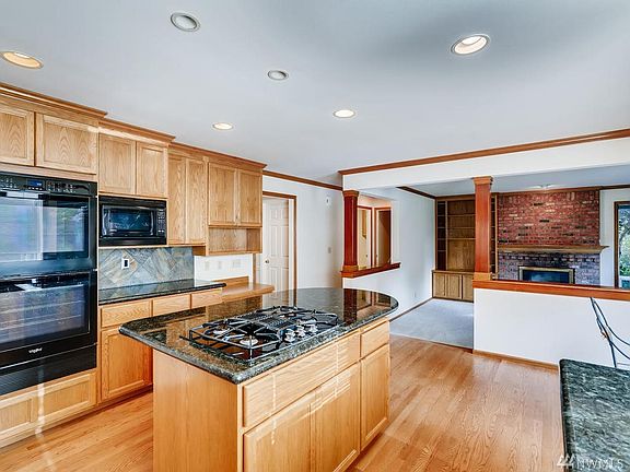 Double oven, loads of cabinet space and tile back splash.