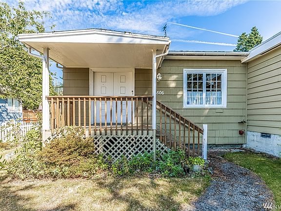 Covered Front Porch Entry Greets Your Guests.
