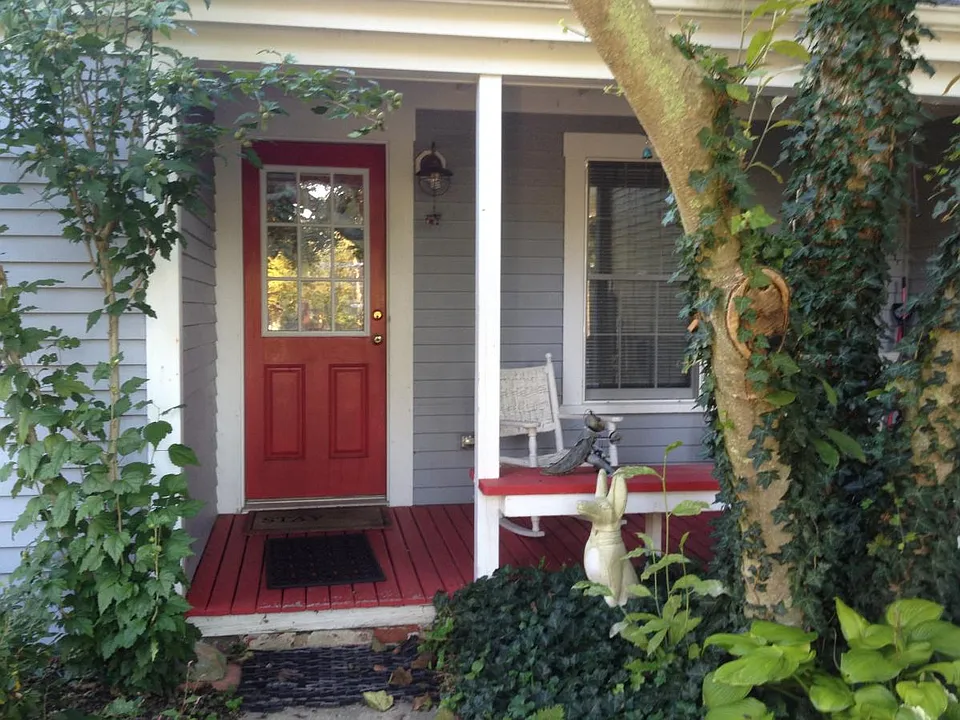 Front Porch entrance with rockers. A cozy protected place to relax.