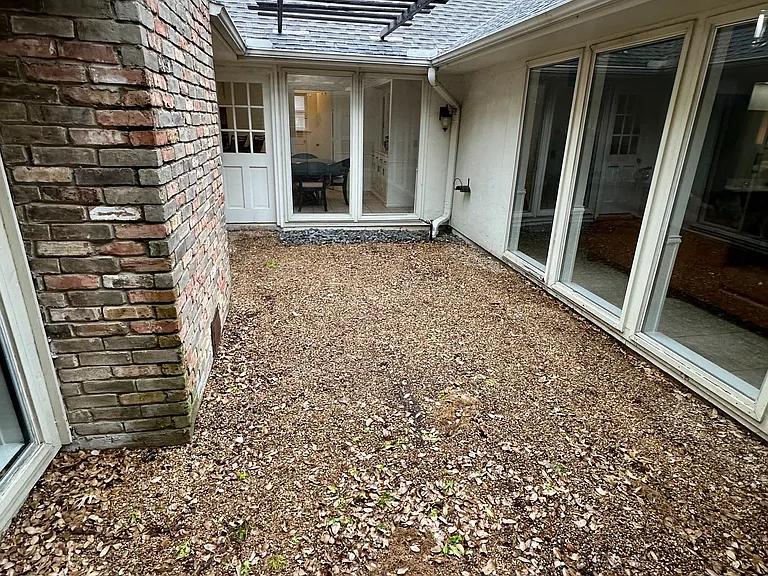View of interior courtyard surrounded by living areas