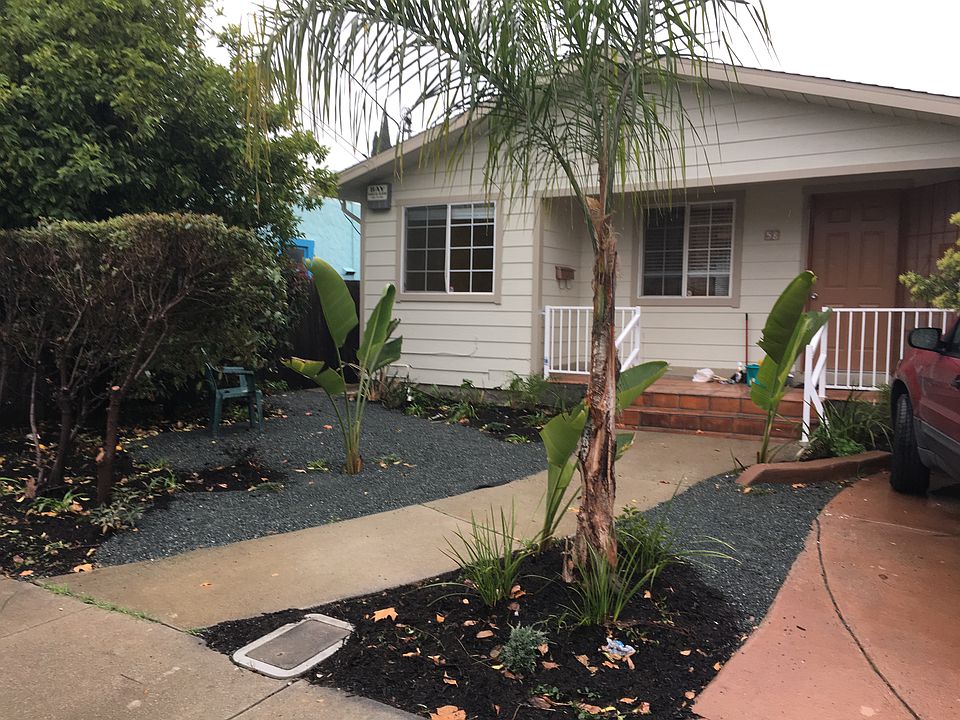 FRONT YARD WITH OFF STREET PARKING ON RIGHT