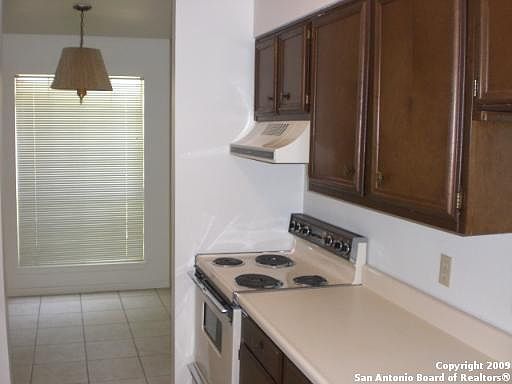 5th image of 8702 VILLAGE DR #106