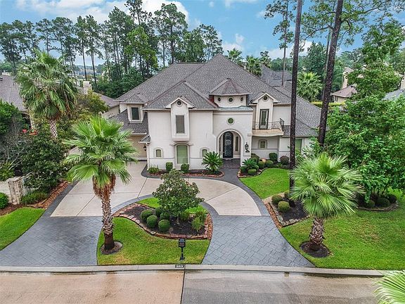 Professionally Landscaped; Outstanding stucco elevation; This beautiful home offers a circle stone-paver driveway