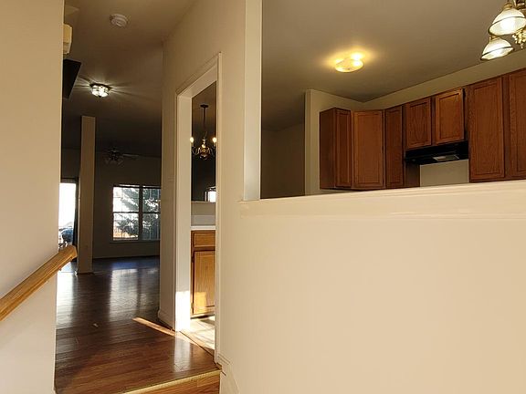 front foyer view, kitchen on right