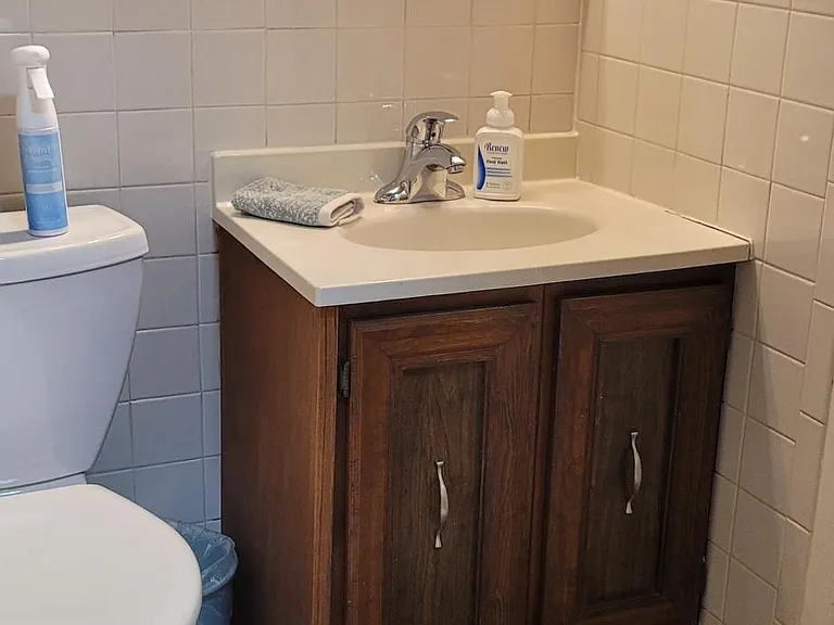 Toilet room off bedroom.