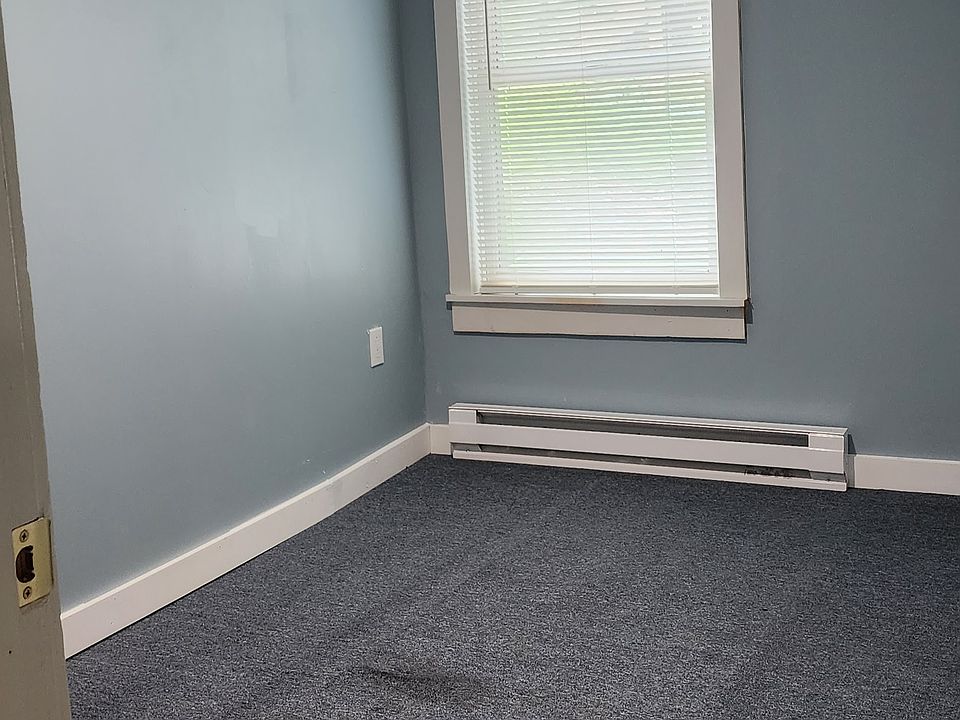 Bedroom - new carpet and new electric baseboard heating