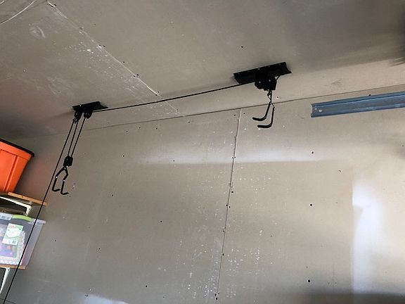 3 Bike hangers in garage
