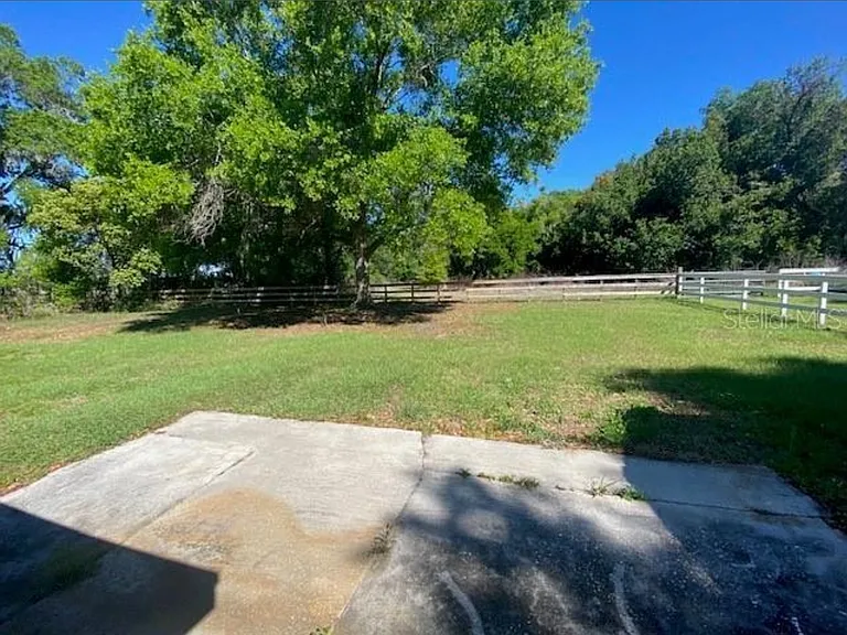 4316 E Knights Griffin Rd — Photo 3