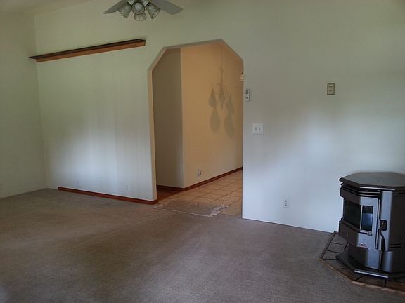 Looking from living room towards kitchen and hallway to main