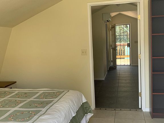 View from bedroom to back deck.