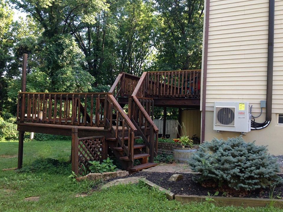 back yard with 3 tier wood deck