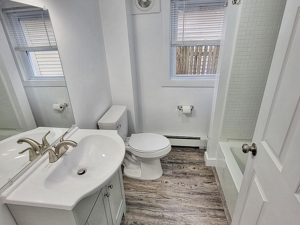 Bathroom with full tub/ shower.