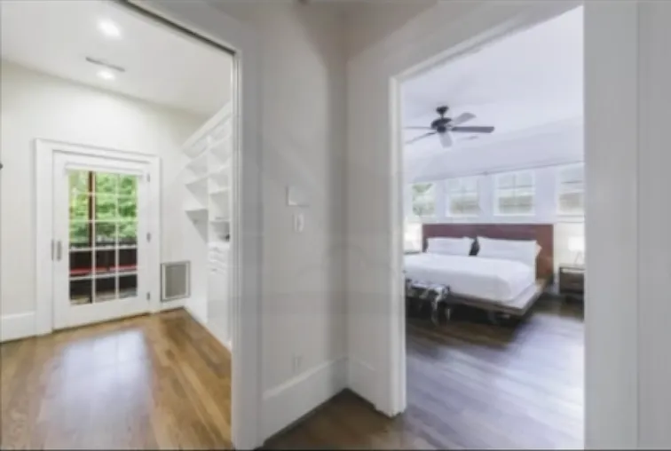 Open the french doors and step into the primary suite - primary bedroom, adjacent walk in closet, huge bathroom with dual sinks and huge back screened in porch