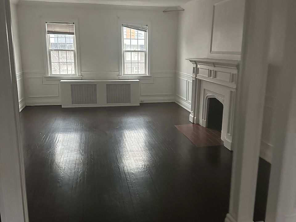 View of the Living Room. Spacious and with a beautiful fireplace