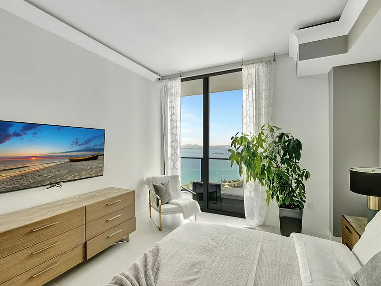 1st Bedroom / Enjoy Unobstructed water views and access to the Balcony from every room.