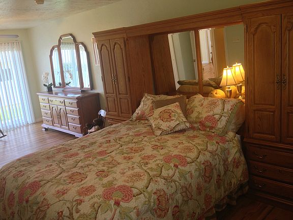 large master bedroom with half bath