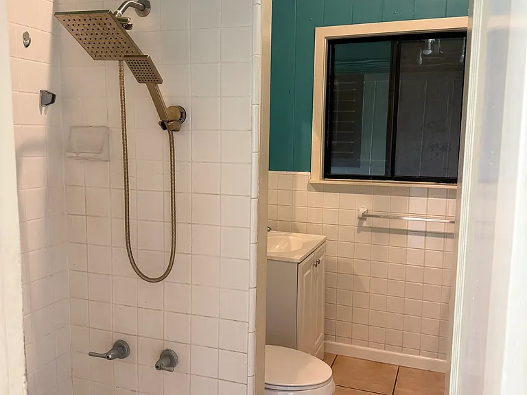 Bathroom with updated shower head