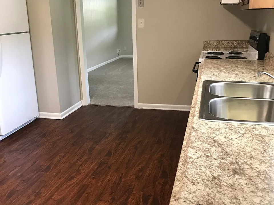 New refrigerator, flooring, sink and microwave