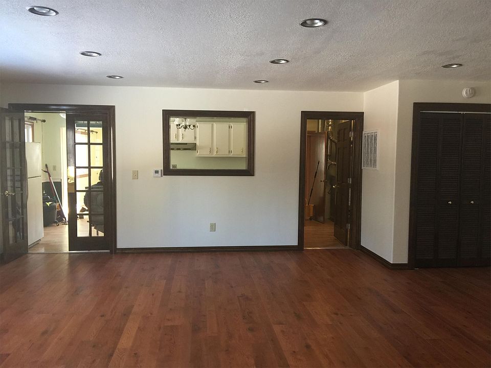 Part of the new addition Living Room/Dining Room, with a pass through window to the kitchen