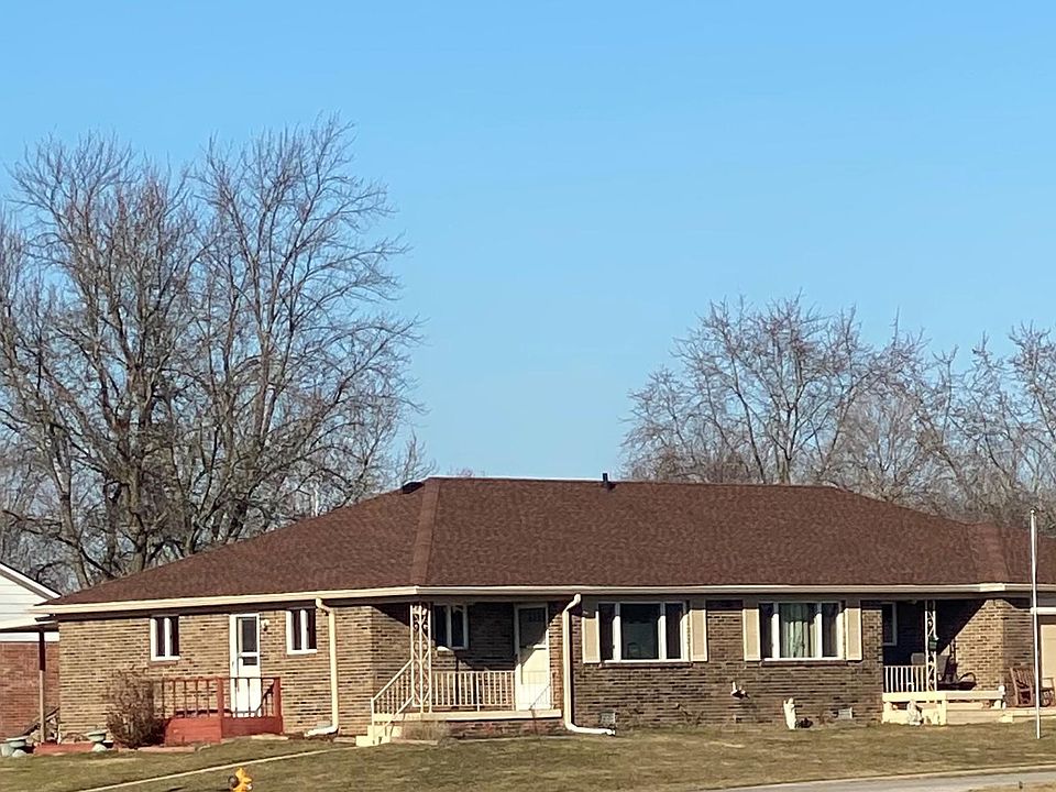 The left side of this picture is what is available (carport side). This is a brick duplex and the garage side is NOT available.