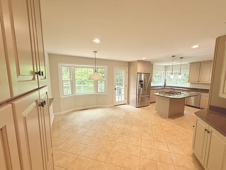 Kitchen with dining area and pantry space