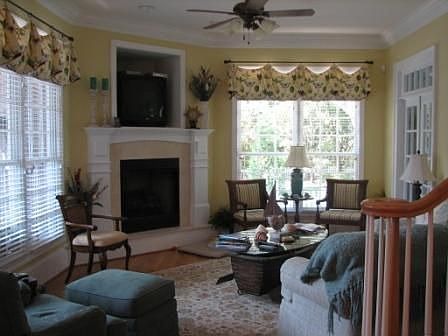 Family room with FP and TV above 