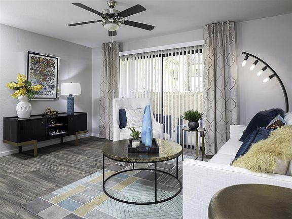 Select homes feature wood-look flooring in the living spaces