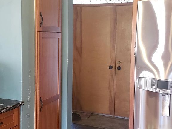 Kitchen to foyer-front door