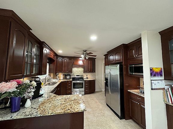 Kitchen with cherry cabinets