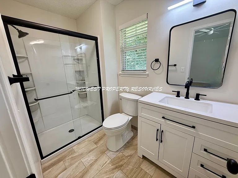 1708 NE Stonewood Dr — Photo 12