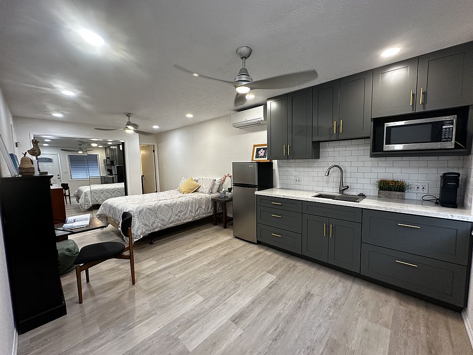 Refrigerator, microwave and silverware included in rental.