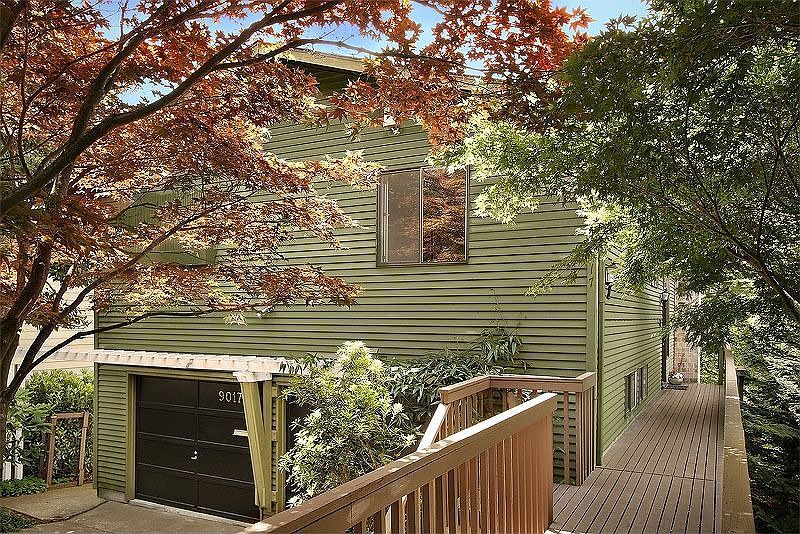 Side entry 1977 home with two floors of living plus large basement