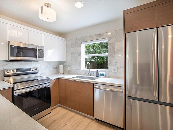 Modern and Custom made kitchen with all new stainless steel appliances