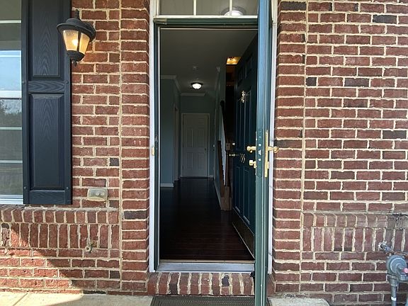 Handsome brick front welcomes you inside