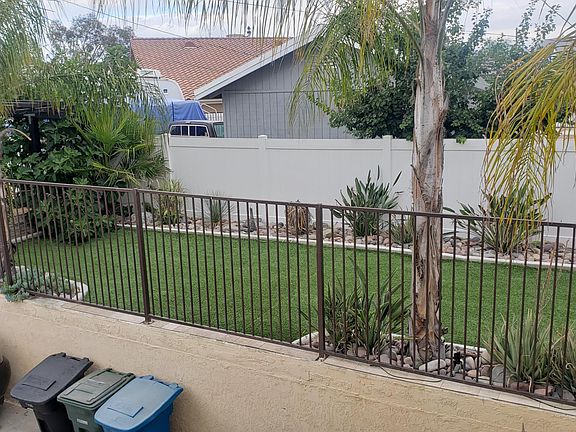 Back yard with astroturf.