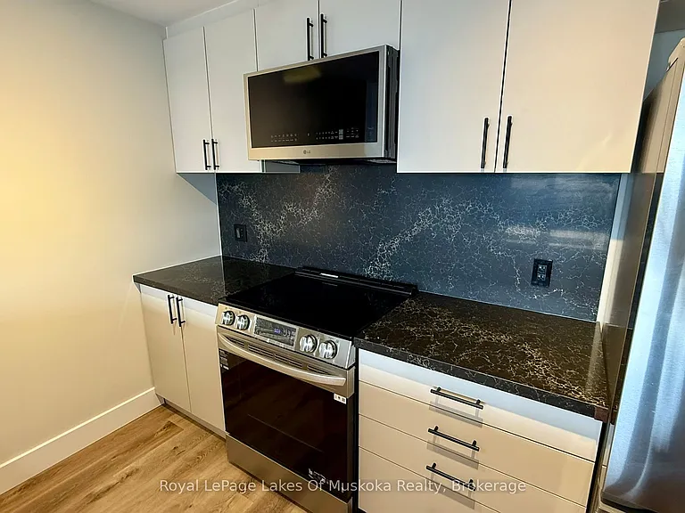 11 Tree Tops Ln #203 — Photo 4