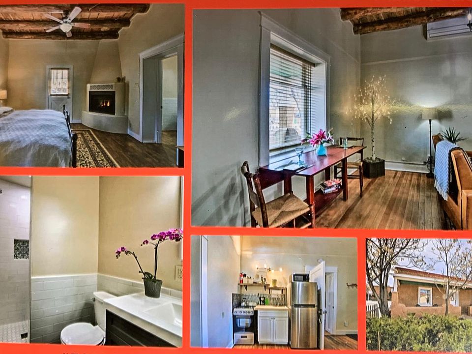 Bedroom with Kiva fireplace, open concept living area/kitchen, newly remodeled bathroom, kitchen area and exterior view with from yard.
