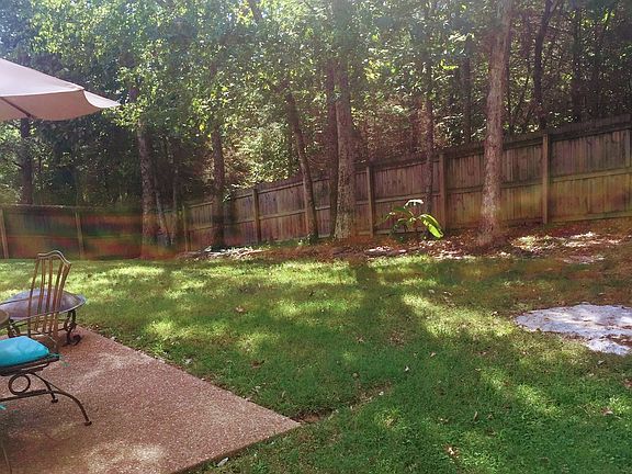 Shady, wooded, fenced lot