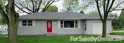 Front Exterior : Lovely shaded front lawn with open lot across the street. Corner lot.