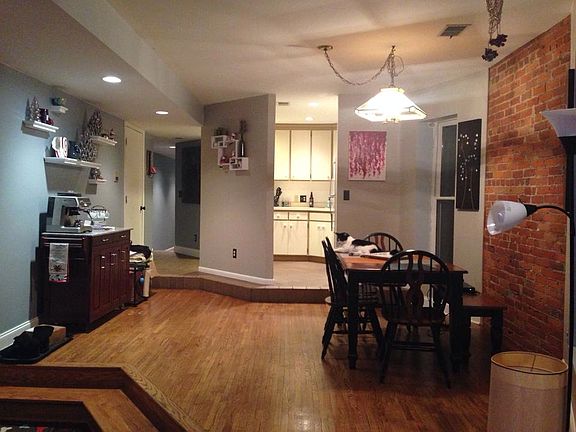 View from living room into dining area and kitchen