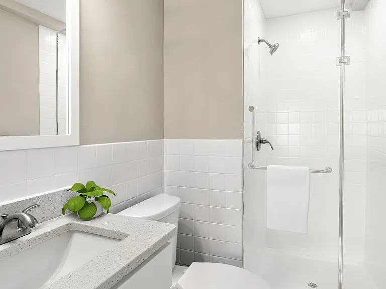 Glass-enclosed shower door in your bathroom