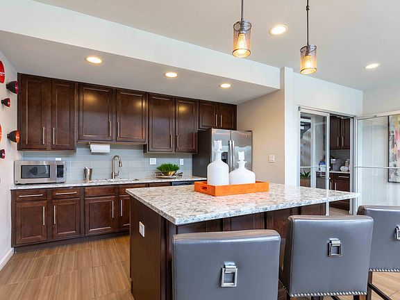 5th image of 6550 S Dayton St #2672044